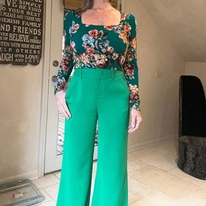 Alice + Olivia size medium green floral top with long sleeves.